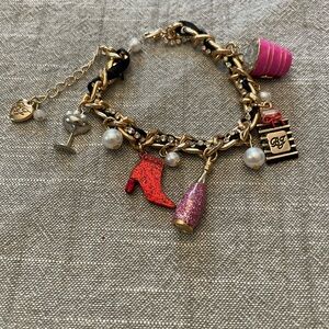 Betsey Johnson Gold and Red Charm Bracelet with Fashionable Charms